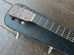 close up: martin rosewood headstock with metal tuners