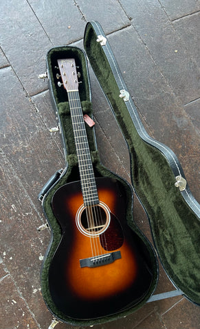 TOp view sunburst Martin acoustic with roswewood fretboard, dot inlays, rosewood headstock