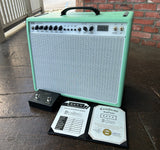 REVV D25 Seafoam Green tolext, whote control panel with eight control knobs and white grill cloth