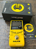 The NUX Loop Core Stereo guitar pedal, yellow with single knob control and single button footswitch