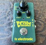 Light green TC Electronics Viscous Vibe guitar pedal with three control knobs, single button foot switch