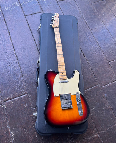 top view sunburst telecaster with cream pick guard, maple neck with maple fender headstock
