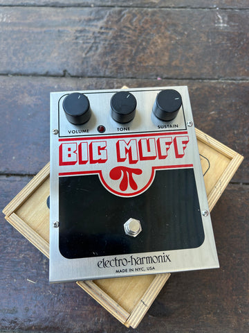 Big Muff pedal, metal with black and three control knobs