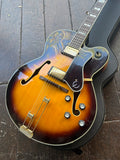 Epiphone sunburst hollowbody with gold pick ups and tortoise pickguard, wood bridge, gold frequencator taailpiecer 