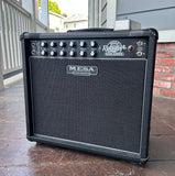 Mesa Badlander, black amplifier, with black tolex, black grill cloth, black control panel, ten control knobs