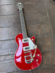 Red gretsch with bigsby, two pick ups, rosewood neck with black headstock