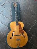 1950's Kay Archtop atop included hardshell case