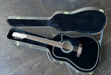 Takamine EF381SC 12-String black finish twelve string acoustic guitar with rosewood fretboard and black headstock