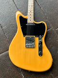 quier Butterscotch offset telecaster, two pick ups, black pick guard, chrome control plate, two chrome know, with three sadddle chrome bridge