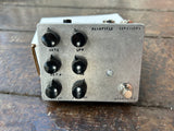 front view Metal Fairfield Ciruitry with six black know, one button footswitch