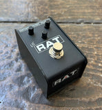 Pro Co Lil' RAT Distortion Pedal black mini guitar pedal, three small controls, with single button footswitch