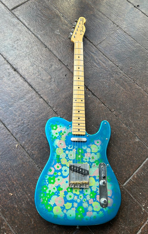 Top view Fender Belecaster Blue floral pattern with maple neck, headstock with Fender logo