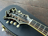 Headstock closeup of The Loar  F-Style, All Solid Hand Carved LM-600