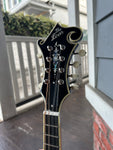 Headstock closeup of The Loar  F-Style, All Solid Hand Carved LM-600