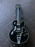 1988 Guild 160 black archtop guitar with rosewood fretboard and black headstock