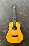 1996 Taylor Baby Taylor Model 305 small body acoustic guitar with spruce top, ebony bridge and fretboard