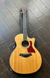 2003 Taylor 414-CE-L4, Limited Fall Edition Grand Auditorium acoustic guitar spruce top, rosewood fretboard and headstock on wood surface