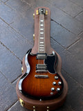 2024 Gibson SG Standard '61 - Tobacco Sunburst electric guitar with chrome hardware, rosewood neck and black headstock on wooden flooring