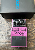 Light purple Boss Flanger BF-3 guitar effects pedal with four control knobs on a textured surface