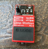 Red Boss Loop Station RC-3 pedal on a textured surface