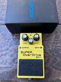 Boss SD-1 Super Overdrive yellow pedal with three knobs control