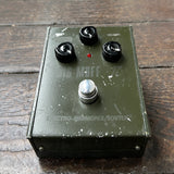 Electro-Harmonix Big Muff SOVTEK Tall Font Russian green pedal with three control knobs on wood surface
