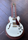 Epiphone IGC 1959 ES-355 - 2024 - Classic White hollowbody guitar, gold hardware rosewood fretboard and black headstock on wooden surface