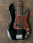 fender bass body black with brown pick guard with two pickups and mental knobs