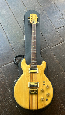 Kay Double cut natural finish with gold hardware, rosewood fretboard and maple headstock