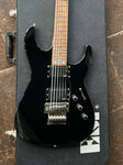 Black LTD with black pick ups, metal bridge