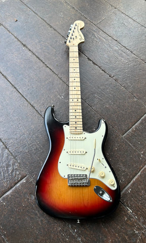 Top view Suburst stratocaster with white pick guard, maple neck and fender maple headstock