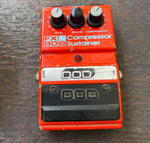 DOD FX80B Compressor Sustainer orange pedal, with three knob controls