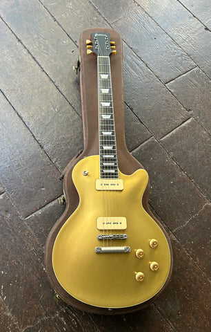 Eastman SB56/N-GD goldtop finish, ebony fretboard with pearl trapezoid, with black headstock 