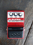 Red DOD Supra Distortion pedal, with three control knobs, 