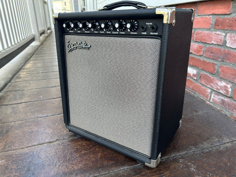 Evans amplifier, black tolex with grey grill cloth front, six know controls in black