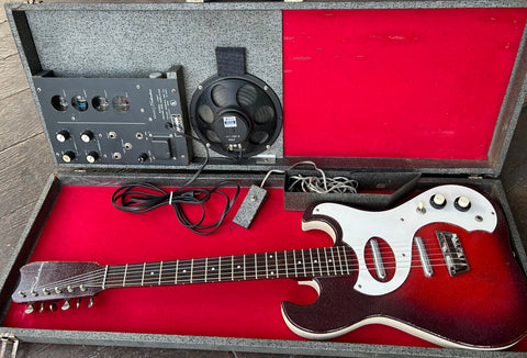 Silvertone Guitar and Amplifier model 1457 in red sparkle sunburst with white pick guard and red headstock