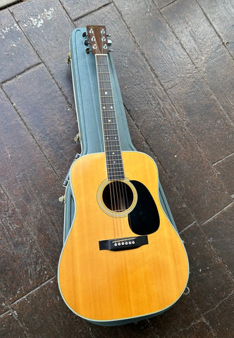 Martin D-35 Spruce top, rosewood bridge, black pick-guard, ebony neck with dot inlays and Martin rosewood headstock