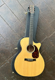 top view Martin spruce top with ebony bridge and tortoise pick guard, ebony fretboard with dot inlays and Martin rosewood headstock