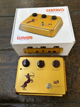 Warm Audio Centavo gold guitar pedal with three knob controls and single button footswitch