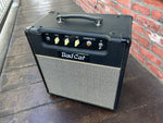 Black tolex amplifier, with grey front, Bad Cat script, three tan control knobs