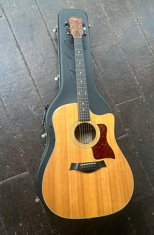 2000 Taylor 310-CE, spruce top, rosewood bridge and fretboard, tortoise pick-guard and rosewood headstock