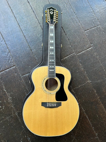 Guild JF65-12 Jumbo 12 string acoustic guitar, spruce top and maple back and sides, ebony fretboard with mother of pearl block inlays with hardshell case