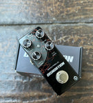 Pigtronix Disnortion distortion mini pedal, black with four control knobs, single metal button footswitch