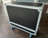 Black and silver flight case on wheels outdoors