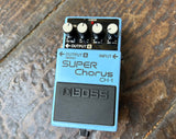 Light blue Chorus pedal with four control knobs, black Super Chorus script