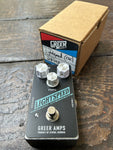 black Guitar effects pedal with 'Greer Amps' branding three control knobs, and single button footswitch