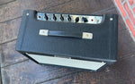 Birds eye view of knobs and handle for Fender Blues Junior