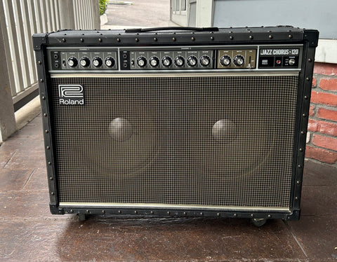 Roland Jazz Chorus 120, black covering, with grey grill cloth, grey control panel twelve control knobs