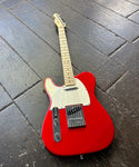 Left handed red Fender Telecaster , with white pickguard, maple neck and headstock