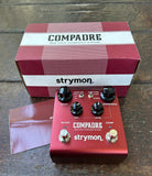 Strymon Compadre red guitar pedal, four control knobs, two button footswitch

